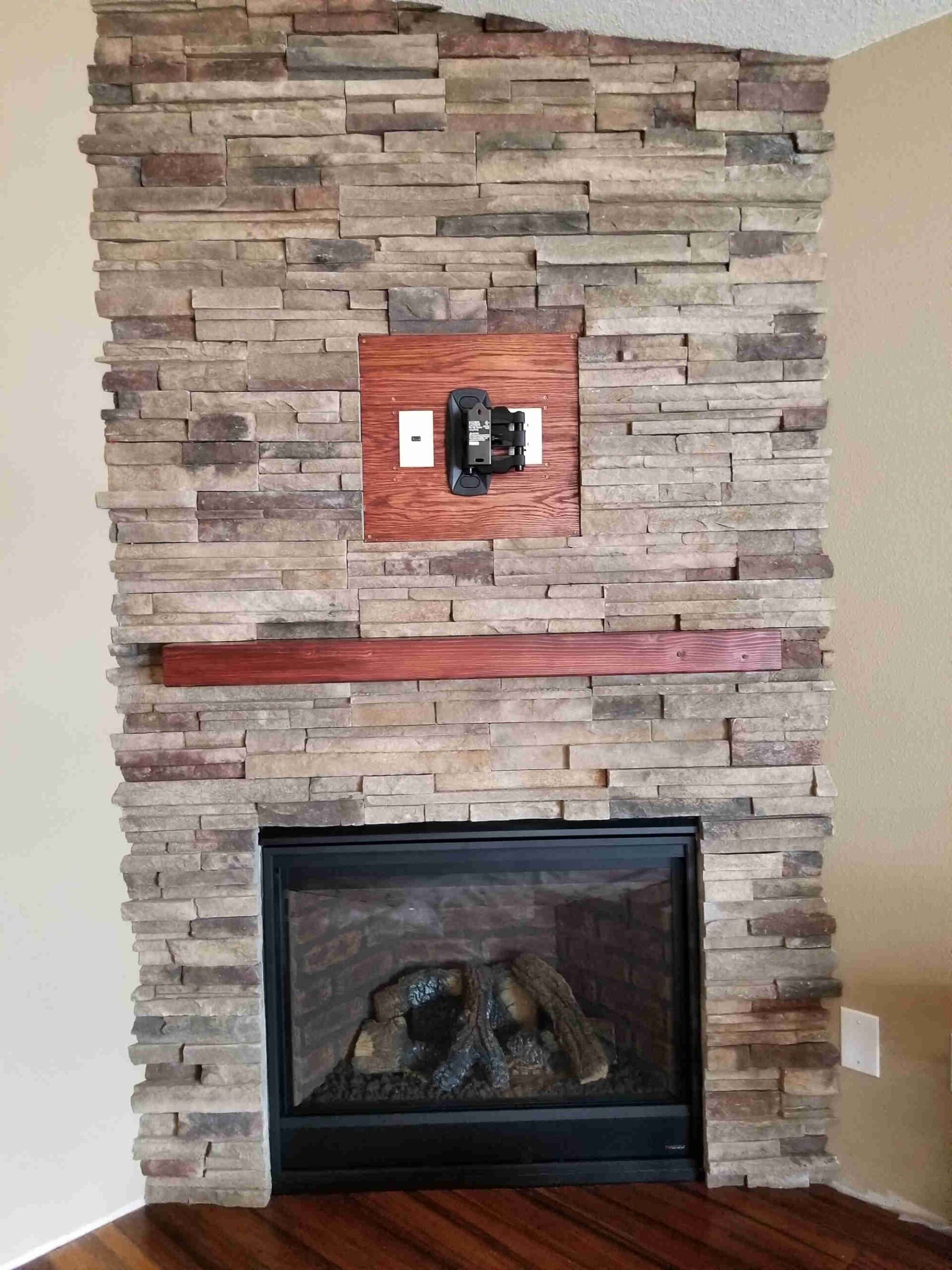 Stone upgraded fireplace and mantel