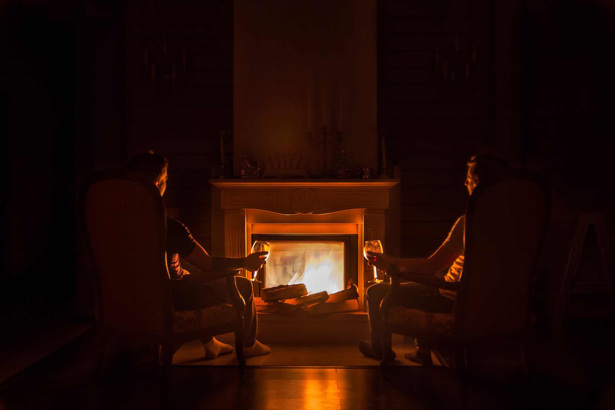 Couple enjoying their fireplace